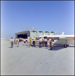 People in Front of a Plane at Aviation Expo, B by Skip Gandy