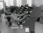 Women Operating Accounting Machines at Tampa Marine Bank, B by George Skip Gandy IV