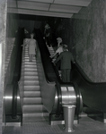 People Using Escalators at Tampa Marine Bank, A by George Skip Gandy IV