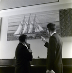 Men Looking at Painting at Tampa Marine Bank, A by George Skip Gandy IV