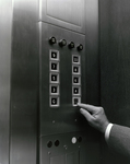 Man Pressing Marine Bank Button in Elevator, A by George Skip Gandy IV