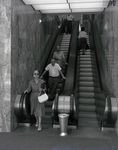 People Using Escalators at Tampa Marine Bank, D by George Skip Gandy IV