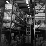 Man on Warehouse Lift, A by Skip Gandy