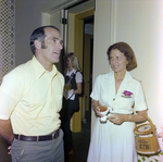 Two Attendees Socialize at Barge Launch Event, Misener Industries by George Skip Gandy IV
