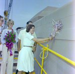 Woman Breaks Bottle Against DC-515, Misener Industries, B by George Skip Gandy IV