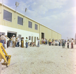 People Socializing by Building at DC-530 Launch, Misener Industries, A by George Skip Gandy IV