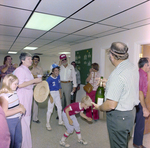 Man Opening Champagne at DC-530 Launch Event, Misener Industries, F by George Skip Gandy IV