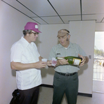 Man Pouring Champagne at DC-530 Launch, Misener Industries, B by George Skip Gandy IV