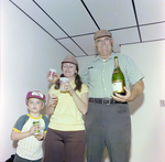 Three Attendees with Drinks at DC-530 Launch, Misener Industries by George Skip Gandy IV