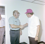 Men Shaking Hands at DC-530 Launch Event, Misener Industries by George Skip Gandy IV