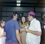 Four Attendees Socialize at DC-530 Launch Event, Misener Industries, A by George Skip Gandy IV