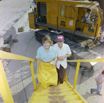 Two Attendees on Stairs at DC-530 Launch, Misener Industries by George Skip Gandy IV