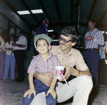 Man and Child at Barge Launch Event, Misener Industries, B by George Skip Gandy IV
