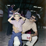 Man and Child at Barge Launch Event, Misener Industries, C by George Skip Gandy IV