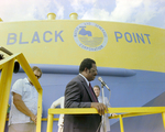 Man Speaking to Audience at Black Point Barge Launch, Misener Industries, B by George Skip Gandy IV