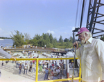Man Speaking to Audience at Black Point Barge Launch, Misener Industries, G by George Skip Gandy IV
