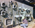 Two Employees Working on Industrial Electrical Panel, Misener Industries, A by George Skip Gandy IV