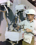 Employee Working on Industrial Electrical Panel, Misener Industries, A by George Skip Gandy IV