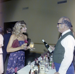 Bartender Serves Attendee at Misener Industries Event by George Skip Gandy IV