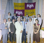 Attendees Under Bacardi Sign at Misener Industries Event, A by George Skip Gandy IV