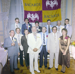 Attendees Under Bacardi Sign at Misener Industries Event, E by George Skip Gandy IV
