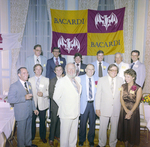 Attendees Under Bacardi Sign at Misener Industries Event, F by George Skip Gandy IV