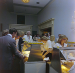 Attendees Grab Food at Misener Industries Event, A by George Skip Gandy IV