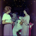 Two Women Talking, Tampa, Florida by Skip Gandy