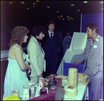 Group Standing Around a Table, Tampa, Florida, A