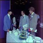 Three Men Standing Around a Table, Tampa, Florida
