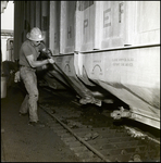 Man Working on ACL 500000 Freight Train Car by Skip Gandy
