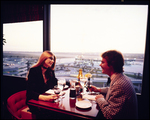 Two Diners Overlooking the Airport, Host Hotel by Skip Gandy