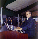 Man Playing Piano at Barnett Bank of Tampa Groundbreaking, B by Skip Gandy