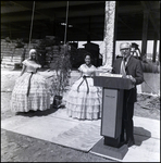 Miss Cypress Gardens and Man at Podium at Groundbreaking for Barnett Bank of Tampa, A by Skip Gandy