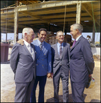 Four Men Laughing at Construction Site, B by Skip Gandy