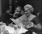 Couple Examines Menu at the Columbia Restaurant