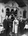 Two Couples Stand in Front of the Bar at the Columbia Restaurant by Skip Gandy