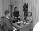Waitress Serves Table at Bern's Steak House