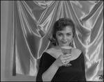 Woman Holds Glass of Tropical Ale, G by Skip Gandy