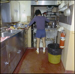 Man Cooks in Commercial Kitchen, A by Skip Gandy