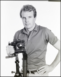 Man Posing with Canon Camera, A by Skip Gandy