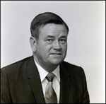 Portrait of a Man Wearing a Suit and Tie, E by Skip Gandy