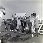 People Being Filmed Shovelling Dirt at a Groundbreaking Ceremony, A by Skip Gandy