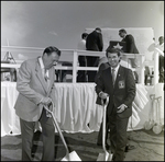 Two Men Holding Shovels at Groundbreaking Ceremony by Skip Gandy