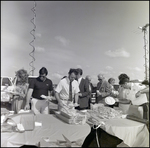 People Getting Food at Groundbreaking Ceremony, A by Skip Gandy