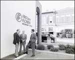 Three Men in Front of the First National Bank of Florida Broadway Office, C by Skip Gandy