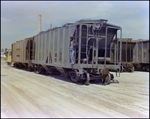 Man standing on CSX Container at Coronet Industries Facility by Skip Gandy