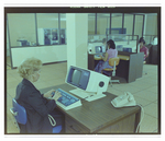 Women Typing at Teleprocessing System Terminal, A by Skip Gandy