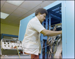 Man Using a Transmission Set on a Teleprocessing System Mainframe, C by Skip Gandy