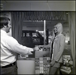 Man and Woman at Renting Facility by Skip Gandy